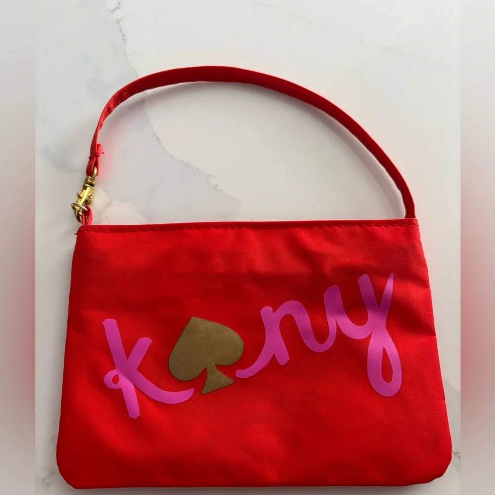 Kate Spade red nylon pouch with pink 